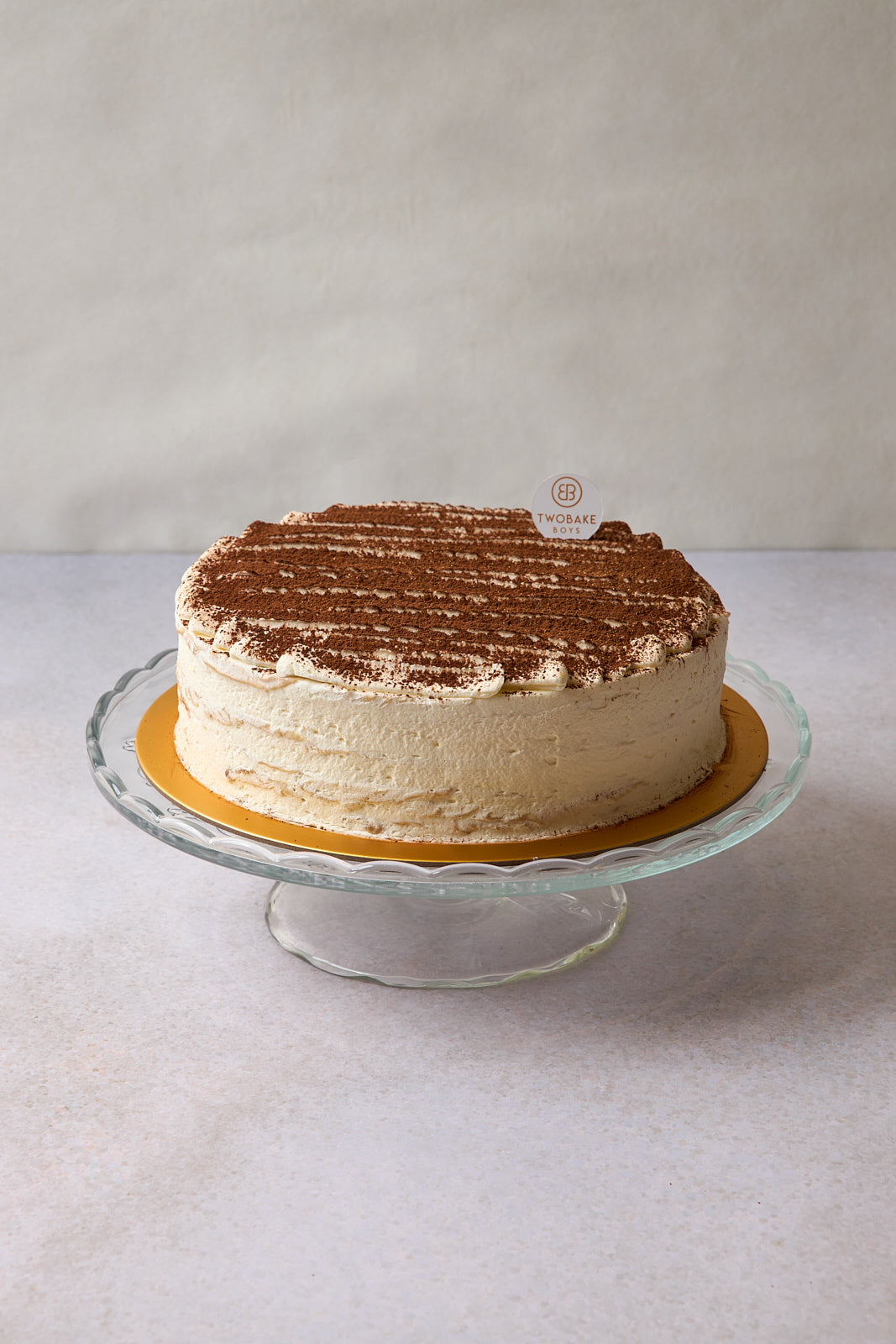 6 inch tiramisu crepe cake topped with tiramisu powder