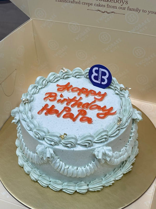 4 inch cream crepe cake featuring the word “happy birthday papa”